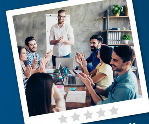 Group cheering in meeting